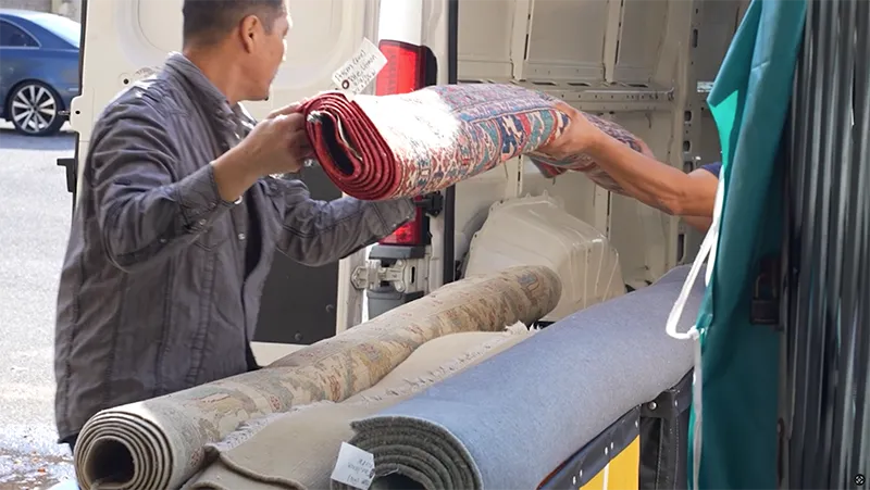 Rug delivery hand-off to customer